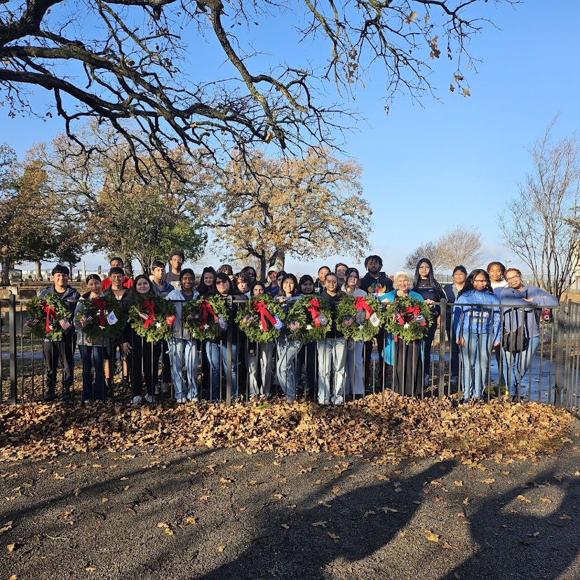 Support & Employee Resources for Veterans BRG placed wreaths on the headstones of veterans as part of National Wreaths Across America Day